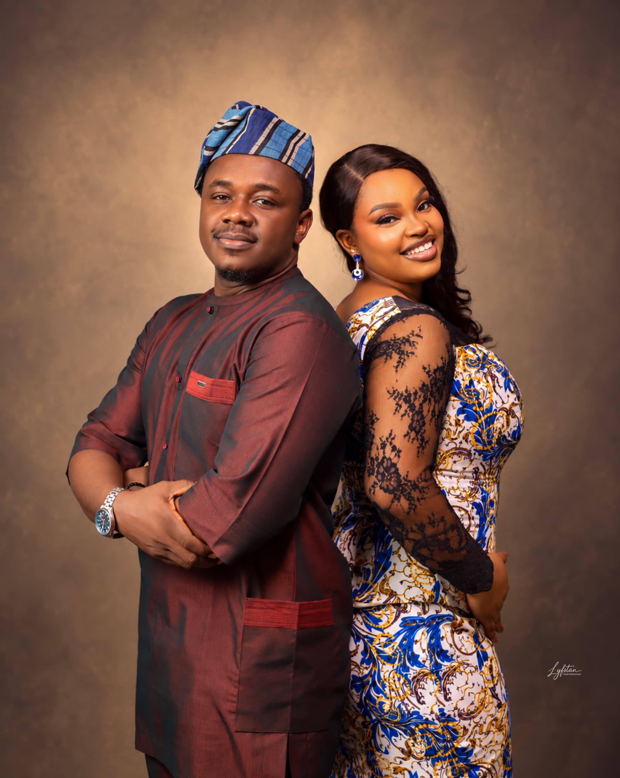 King Teeklass Ekong and Esther The Queen standing back to back